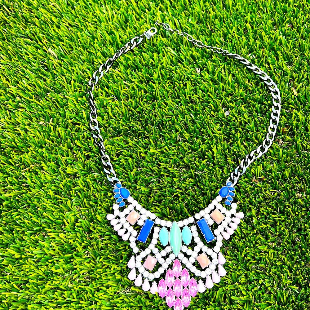 Stunning logo gunmetal with multi color stones